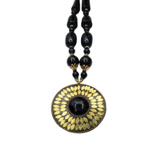 black-beaded-statement-neckpiece-with-monumental-pendant